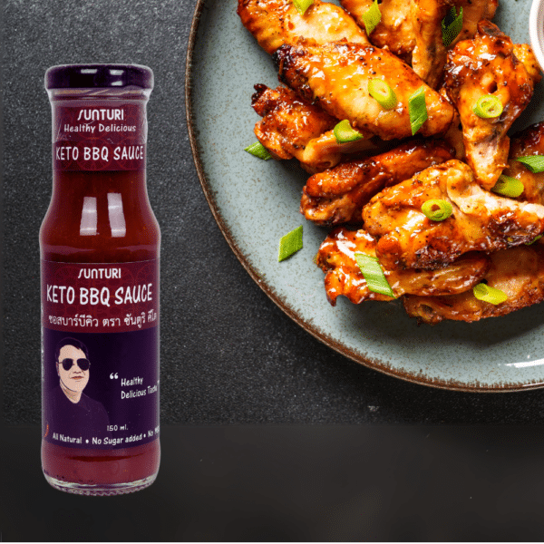 Grilled chicken wings coated in Sunturi Keto BBQ Sauce, showcasing its smoky flavor and keto-friendly ingredients